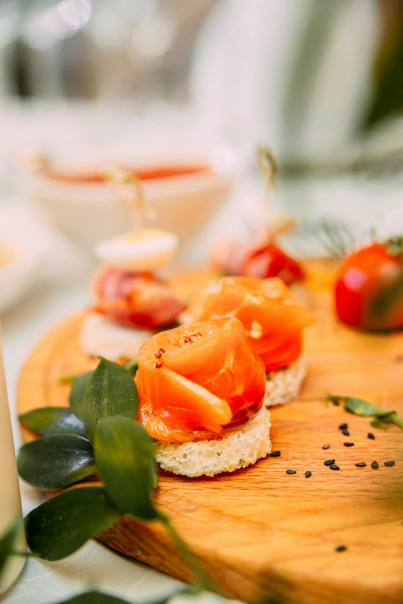 Served plate with portions of appetizers made of fresh bread and vegetable placed on banquet table